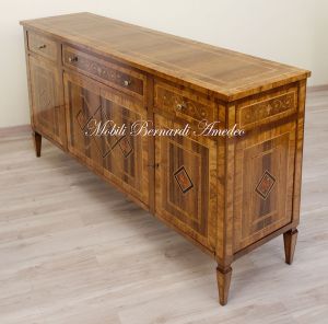 Handcrafted sideboard made of solid wood and richly inlaid in walnut and olive wood in neo-classical style